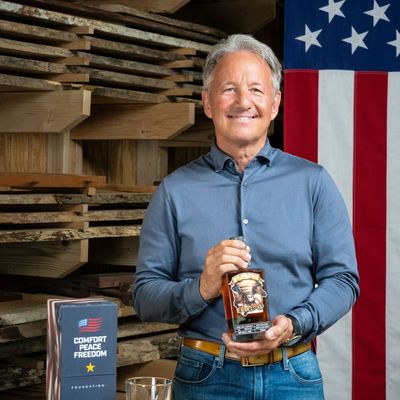 Ken Rusk holding Freedom Bourbon